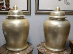 Pair of Large Silver Gilded Ceramic Urns.