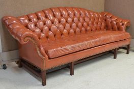Chippendale Style Rust Orange Leather Sofa.