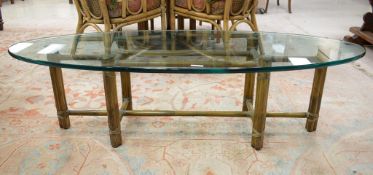 McGuire Furniture Oval Glass Top Coffee Table.