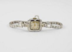 Lady's Vintage Wristwatch with White Gold Band.