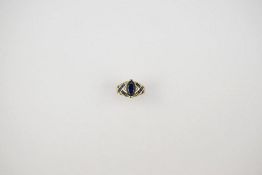 10K Yellow Gold ring with Synthetic Sapphires.