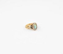 Yellow Gold Ring with Opal Cabochon.