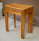 Set of (3) Modernist Blonde Wood Nesting Tables.