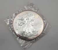 1990 American Eagle 1 Pound Silver Coin.