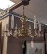 Gilt Metal 6-Light Chandelier With Drop Prisms.