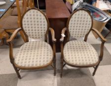 Pair Of Carved Oak Medallion Back Armchairs