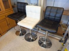 (3) Chrome Adjustable Bar Stools With Vinyl Seats. (2 Black And 1 White).