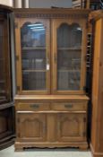 Mahogany Glass Front 4-Door China Cabinet.
