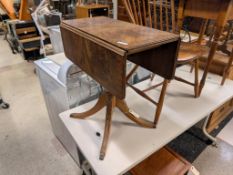 Drop Leaf Occasional Table And A Pedestal Table.