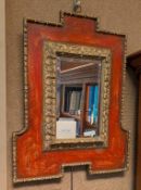 Baroque Style Parcel Gilt And Red Painted Mirror.