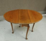 Queen Anne Style Oak And Cherry Drop Leaf Table.