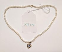 Pearl Necklace With 14k Heart Pendant With Blue Stone And 14k Clasp.