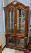 Contemporary 4-Door Lighted Display Cabinet.