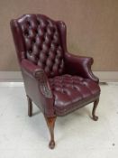 Maroon Leather Wing Back Club Chair.