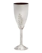 A modern silver champagne flute by Mark Stevens.
