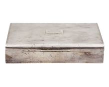 A silver engine turned cigarette box by Harman Brothers.