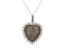 A silver and diamond heart-shaped St. Christopher's pendant necklace.