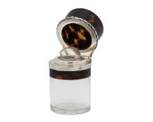 An unusual Edwardian silver and tortoiseshell pique ware hinge lidded glass scent bottle.