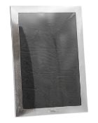 A George V silver-mounted large rectangular photograph frame by Samuel M Levi.