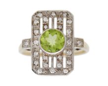 An Art Deco-style 9k gold peridot and diamond ring.