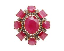 A large and impressive silver gilt ruby and diamond dress ring.