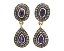 A pair of silver gilt sapphire and diamond pendant earrings.