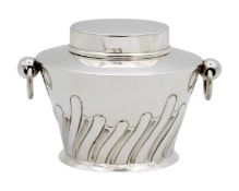 A George V silver tea caddy with twin ring handles by William Hutton.