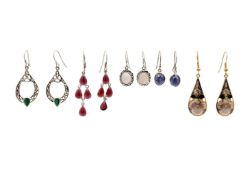 An assortment of silver and jemstone earrings with a pair of 9k gold small hoop earrings.