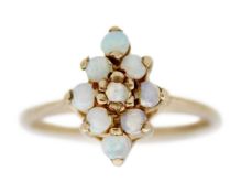 A 9k opal set cluster ring.
