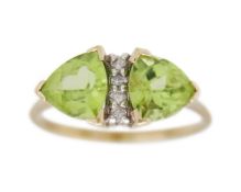 A 9k gold peridot and diamond ring.