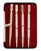 A sterling silver and enamel set of four Bridge propelling pencils.