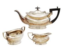 A George V silver three-piece tea set by Cooper Brothers & Sons Ltd.