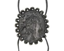 A jet cameo buckle.