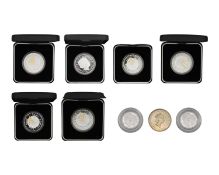 A collection of seven 2000 Millennium silver proof £5 coins, together with 2 x 2000 silver proof £1.