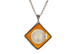 A vintage ladies' pendant watch on a silver chain.