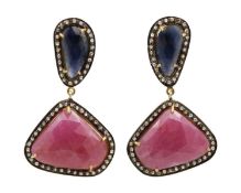 A pair of unusual, silver gilt, sapphire, ruby, and diamond pendant earrings.