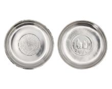 Two silver coin inset pin dishes.