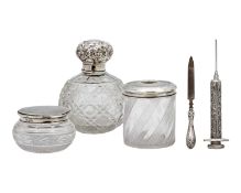 A selection of silver-mounted dressing table items.