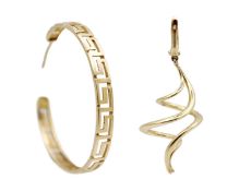 A 14k spiral design earring and a 9k Greek key hoop earring.