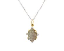 A 14k gold Labradorite carved Buddha pendant on a silver cable chain.