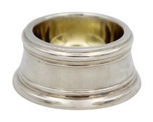 A George V silver trencher salt by Wakely & Wheeler.