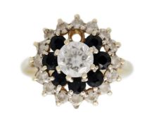 A 9k gold CZ and sapphire cluster ring.
