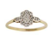 An 18k and platinum diamond ring.