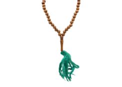 A string of wooden Mala prayer beads.