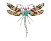 A silver dragonfly brooch/pendant set with emerald, rubies, and diamonds, and enamel inlays.