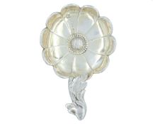 An early Victorian parcel-gilt silver caddy spoon, by Hilliard and Thomason,