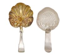 Two George III silver ornate caddy spoons, both restored.