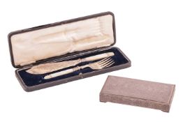 A Middle Eastern white metal cigarette box, the hinged cover and sides with repeating chased decorat