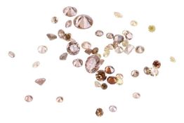 1.86ct melee parcel of loose diamonds in tinted yellowish and brownish colour, of mostly round brill
