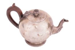 A Victorian silver bullet-shaped bachelor teapot, by Charles Stuart Harris, London 1878, with an urn
